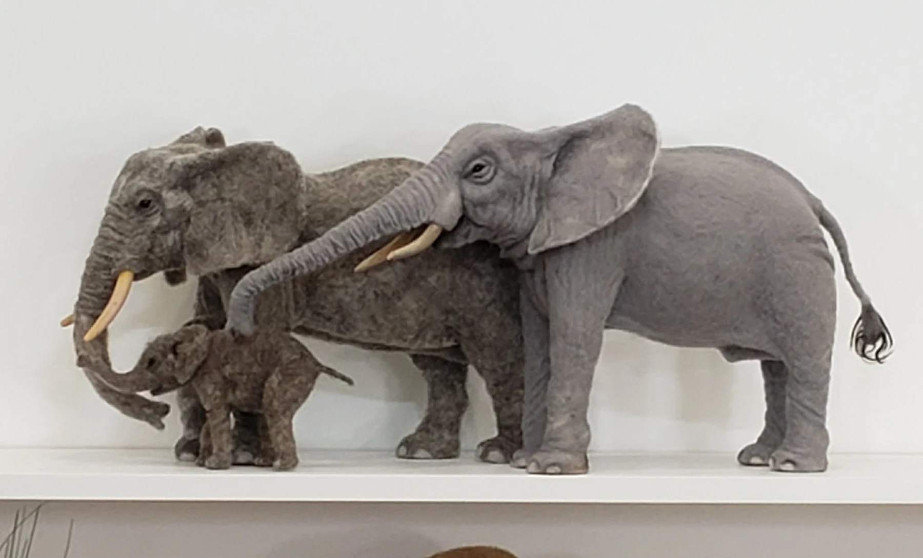 Front view of needle-felted elephant family sculpture by Irina Hughes