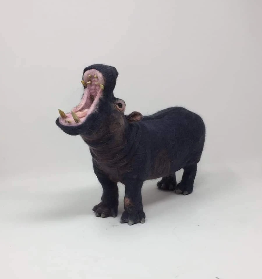 Needle-felted hippopotamus sculpture with open mouth by Irina Hughes